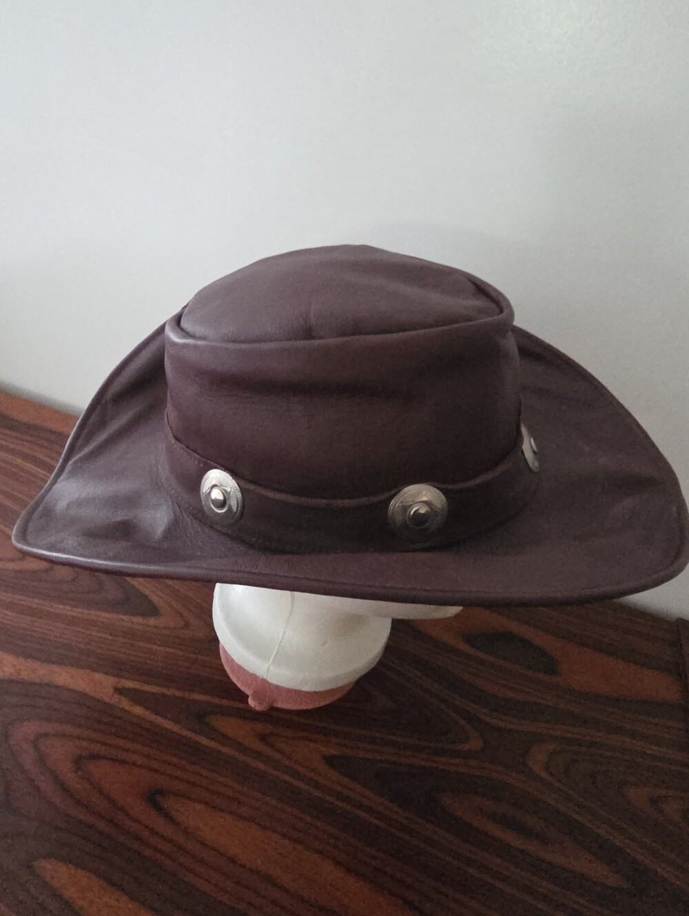 Leather Western-style hat, distinct silver conchos, structured wide Brim, Medium